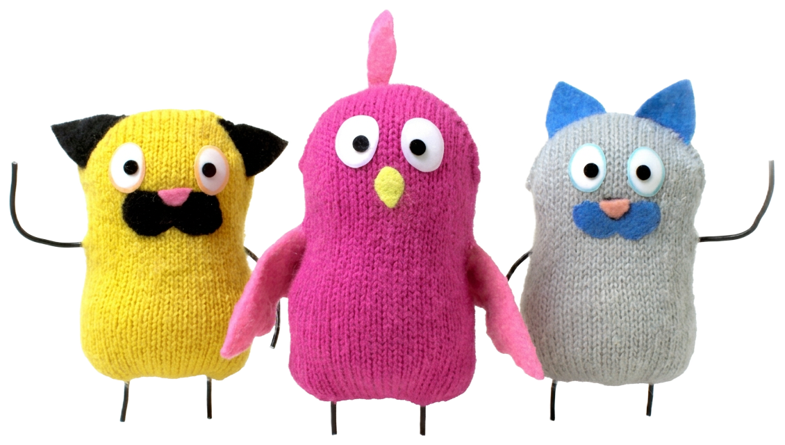Three knitted Talking Planet characters
